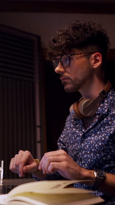 Focused Producer Immersed In Creative Studio Session