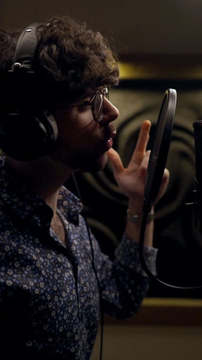 A Vocalist Captures Emotion In A Studio Session