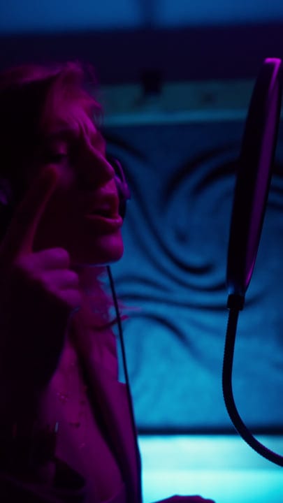 Capturing Intensity In A Dimly Lit Recording Studio