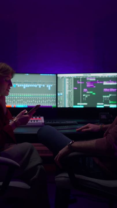 Creative Minds Collaborate in a Vibrant Music Studio