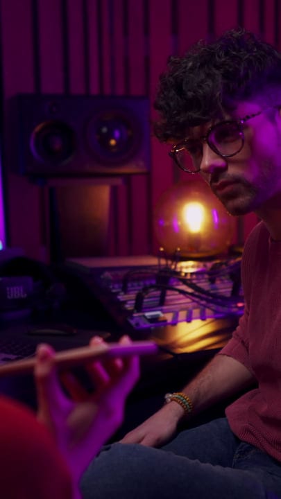 Creative Producer Immersed In Studio's Warm Glow