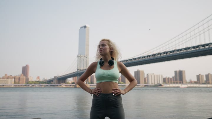 Confident Runner Pauses By Iconic NYC Skyline