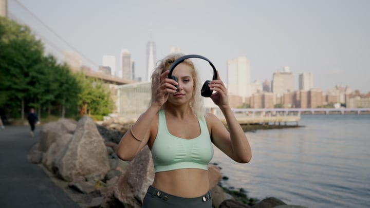 Morning Runner Prepares With Headphones In New York City