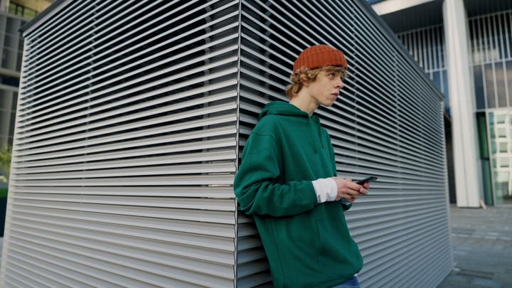 Urban Youth Contemplating Evening City Vibes