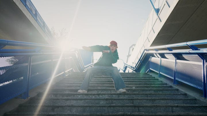 Urban Dancer Captivates On Sunlit Staircase