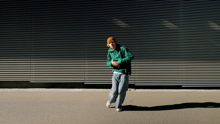 Urban Street Dancer Embraces Nightlife Energy Outdoors