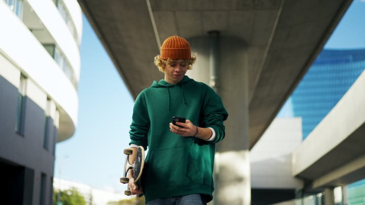 Young Urban Skater Navigates City Streets With Style