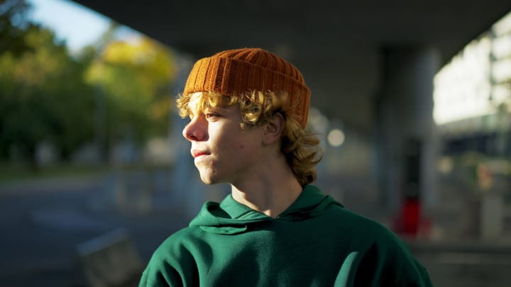 Golden Hour Reflections On A Young Street Dancer