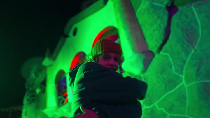 Street Dancer Illuminated By Vibrant Neon Night Lights
