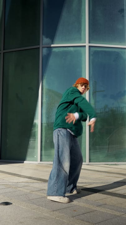 Dynamic Moves Under City Lights In The Night Air