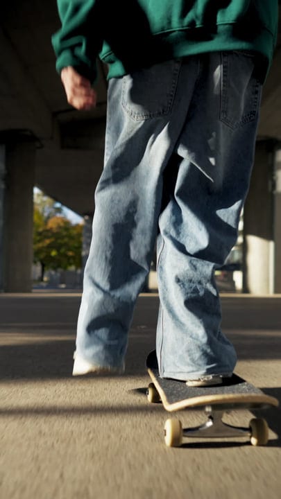 Effortless Glide Through Urban Streets At Dusk