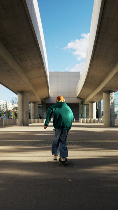 Skater Glides Through Urban Underpass On Sunny Day