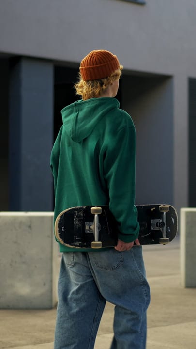 Young Urban Skater Embraces Nighttime Vibes in the City