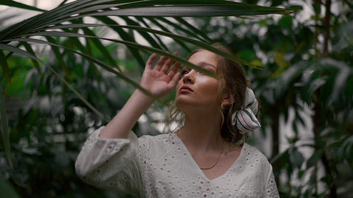 Exploring Serenity Amidst Lush Tropical Leaves