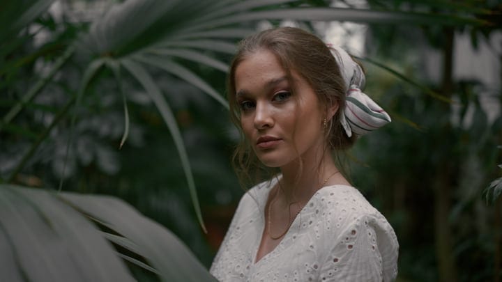 A Contemplative Moment in a Lush Tropical Oasis
