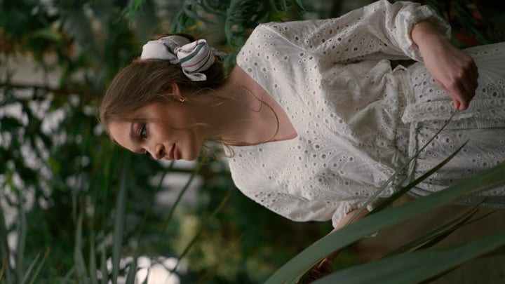 Elegance Unfolds Amidst Lush Tropical Greenery