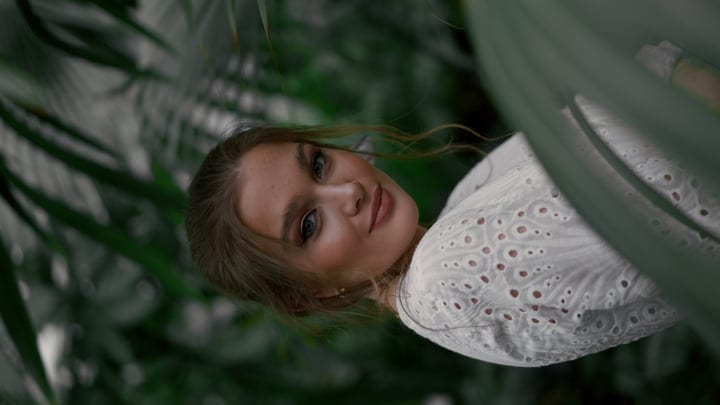 Serene Glance Amidst Lush Greenery In Tropical Oasis