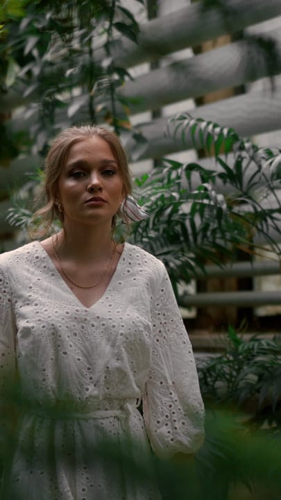 Contemplative Stroll Through Lush Tropical Greenery