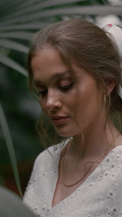 Graceful Contemplation Amidst Lush Tropical Foliage