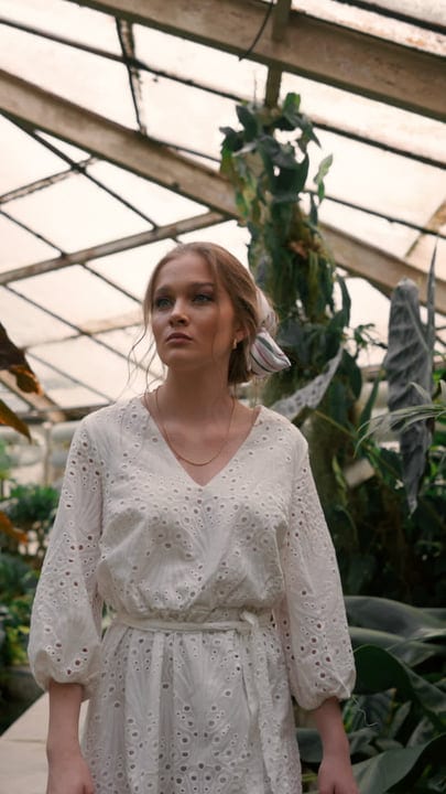 Contemplative Stroll Through Lush Tropical Greenhouse