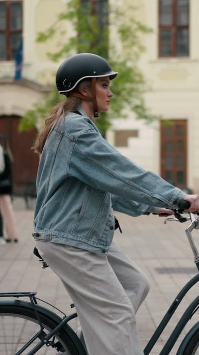 Cyclist Navigates Urban Streets With Confidence