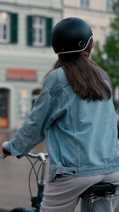 Urban Cyclist Embraces Freedom In Her Denim Jacket