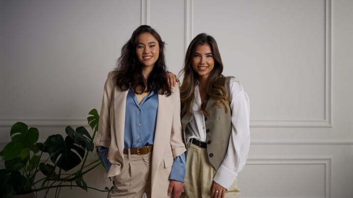 Two Women Embrace Elegance In Neutral Tones