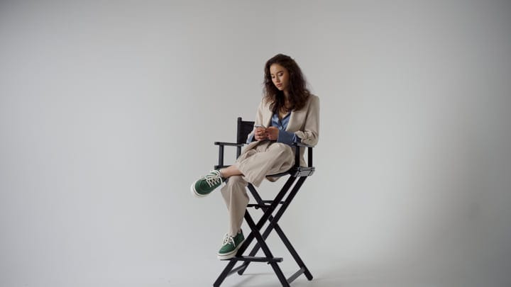 Contemplative Moment In A Chic Neutral Ensemble