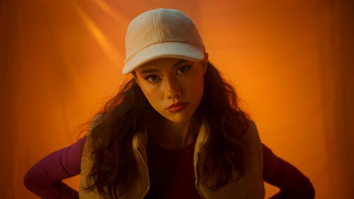 Youthful Energy Captured in Warm Studio Lighting