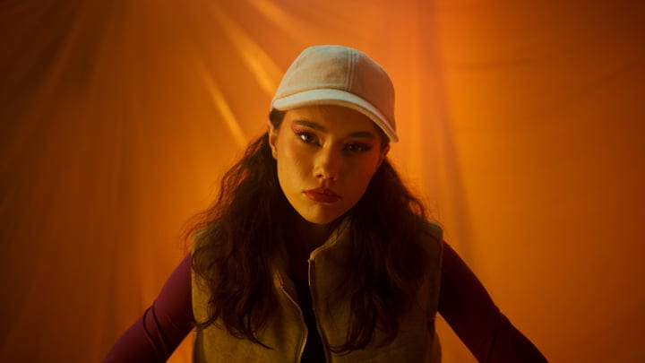Confident Expression Under Warm Studio Lights