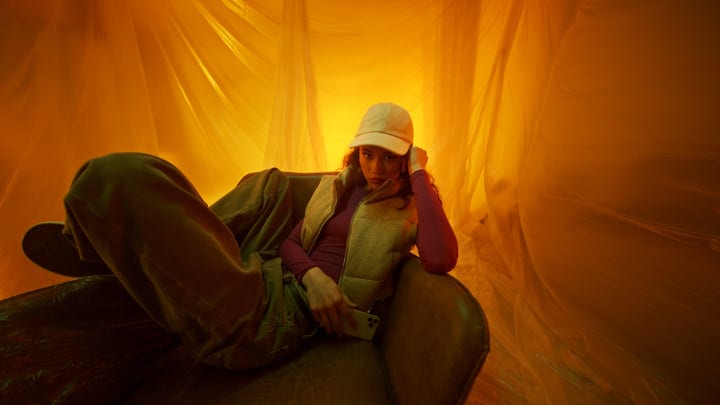 Relaxed Confidence In A Warm-Hued Studio Setting