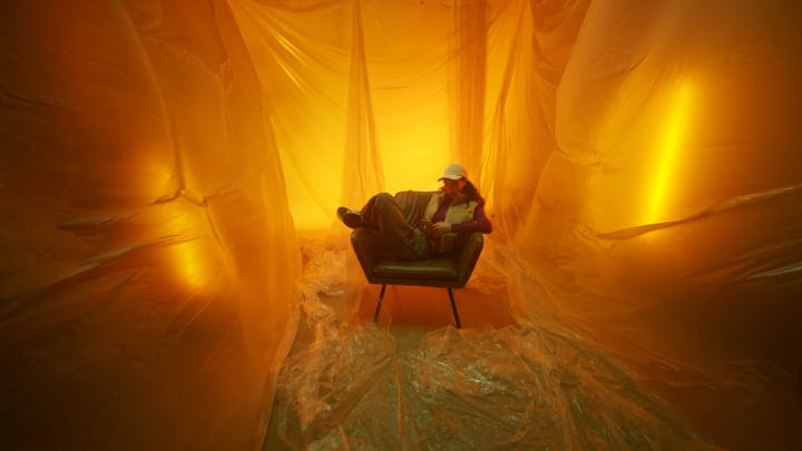 Contemplative Fashion Moment In A Golden Glow