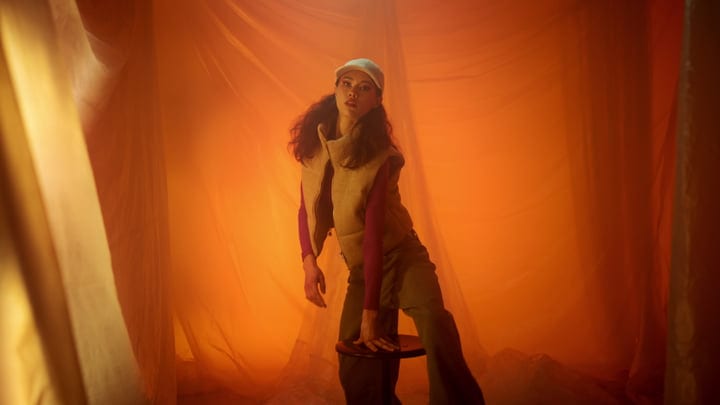 Warm Hues Frame A Stylish Model In Studio