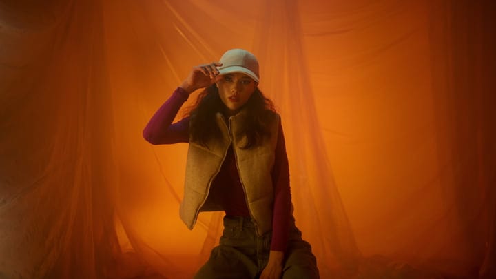 Embracing Autumn Layers In A Warm Studio Glow