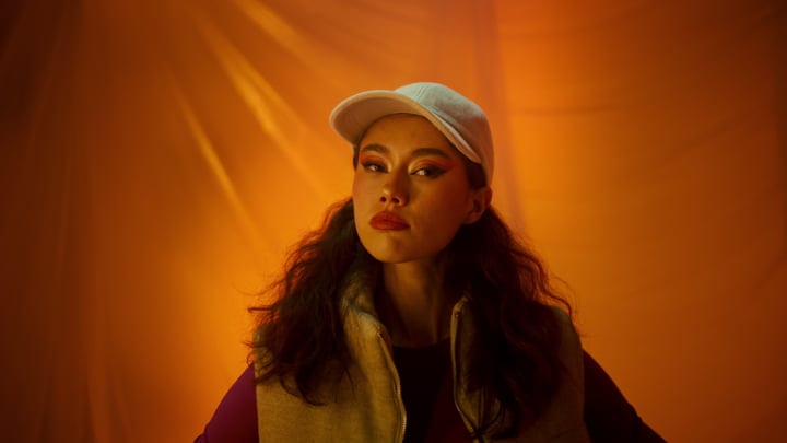 Bold Expression Against a Warm Studio Backdrop