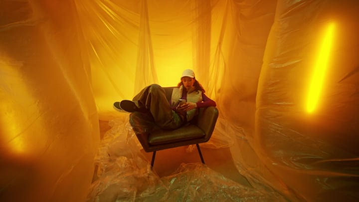 Youthful Contemplation Under Warm Studio Lights