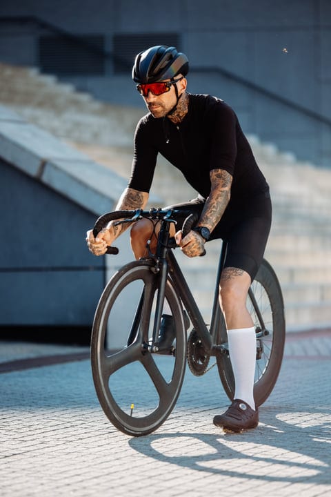 Urban Cyclist Carves Path Through City Streets