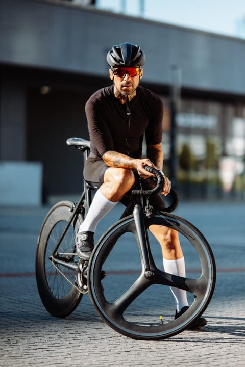 Urban Cyclist Embraces a Sunny City Adventure