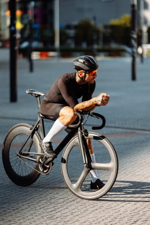 Urban Cyclist Navigates City Streets With Determination