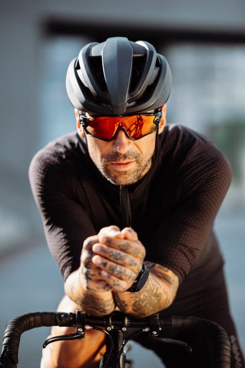 Focused Cyclist Prepares For Urban Adventure Ride
