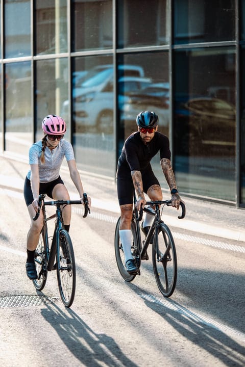 Cyclists Enjoy a Sunny Urban Adventure Together