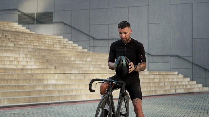 Urban Cyclist Prepares For A City Adventure