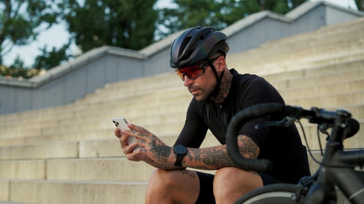 Cyclist Takes A Break To Check His Phone