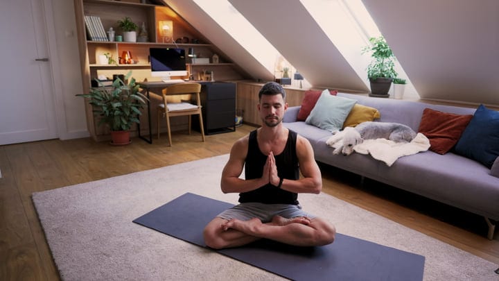 Man Meditates Peacefully In His Cozy Home Office