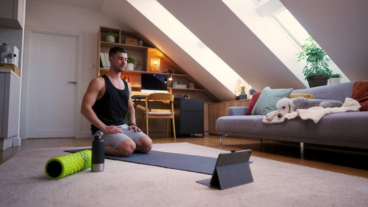 Morning Calm: Man Meditating in Modern Loft Space