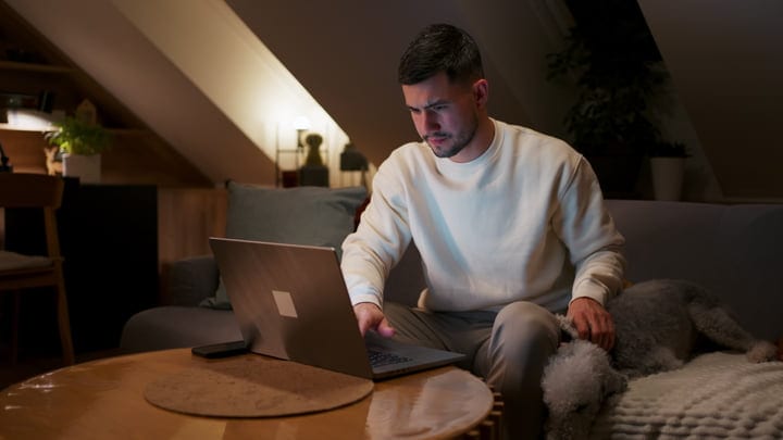 Focused Evening Work Session In Cozy Home Office