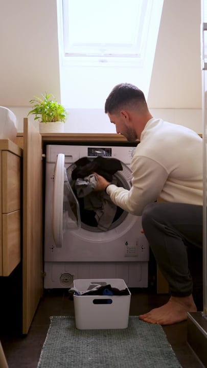 Man Balancing Work And Home Chores With Ease