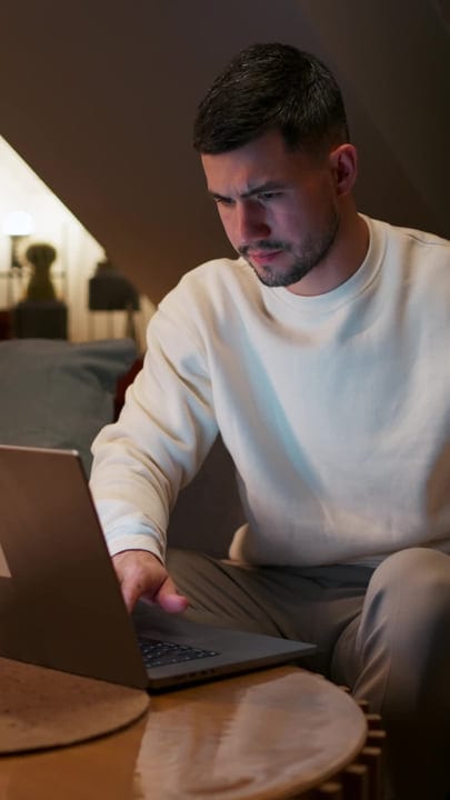 Focused Evening Work Session In A Cozy Home Setting