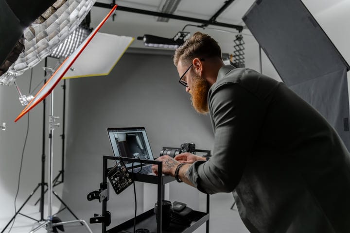 Meticulous Adjustment In A Professional Photography Studio Setup