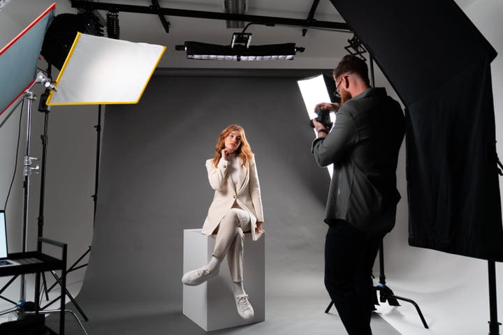 A Photographer Captures Elegance In Studio Lighting Setup